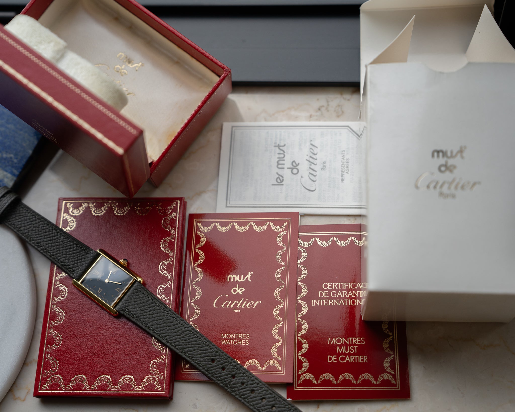 Cartier Must Tank black dial Roman Numeral LM size - Box & Papers
