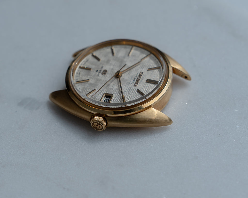 Grand Seiko 5645-7005 linen dial in 18k yellow gold July 1971