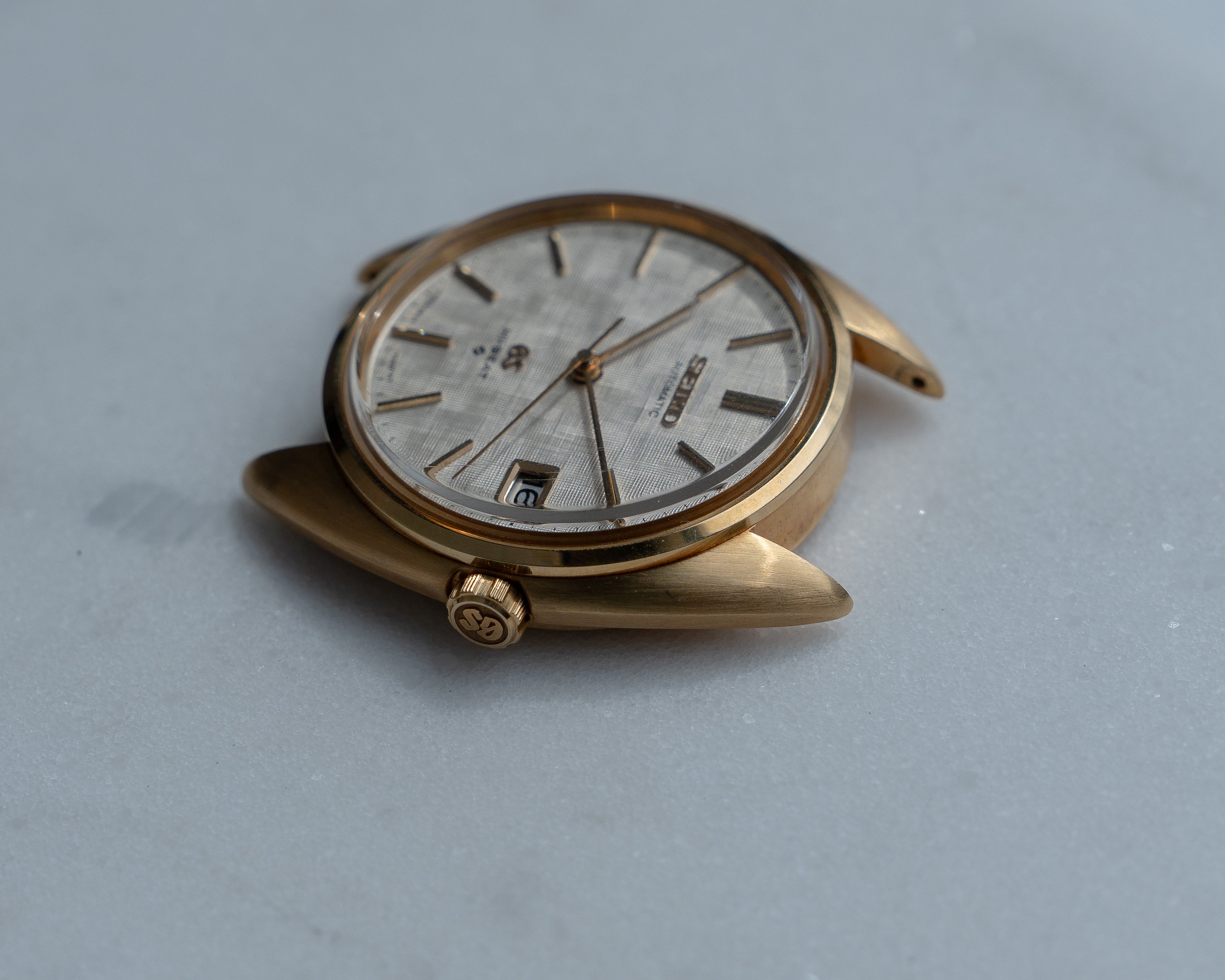 Grand Seiko 5645-7005 linen dial in 18k yellow gold July 1971