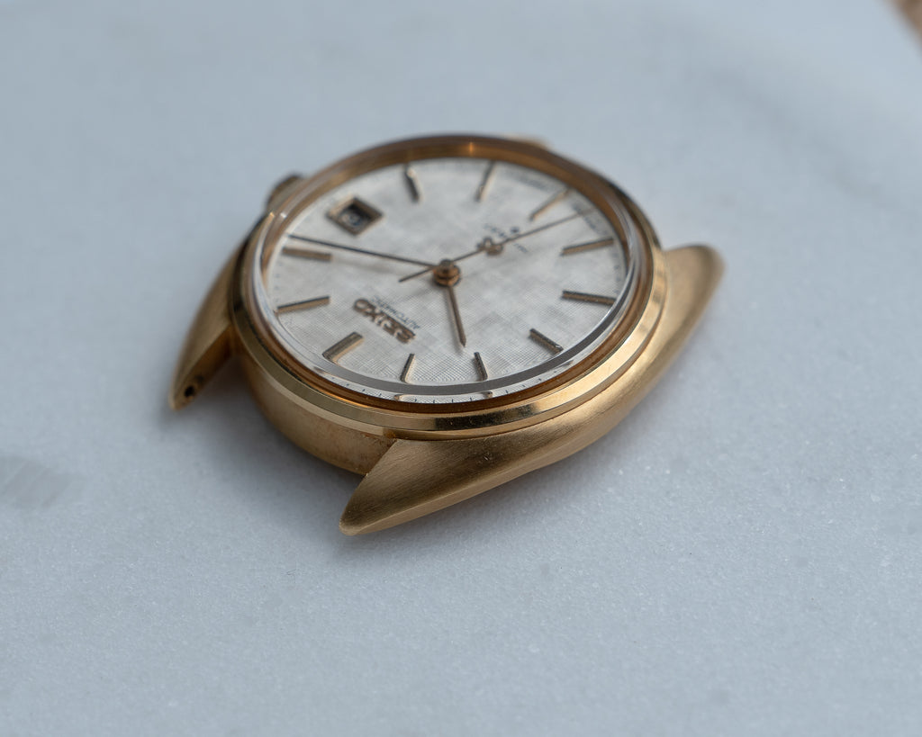 Grand Seiko 5645-7005 linen dial in 18k yellow gold July 1971