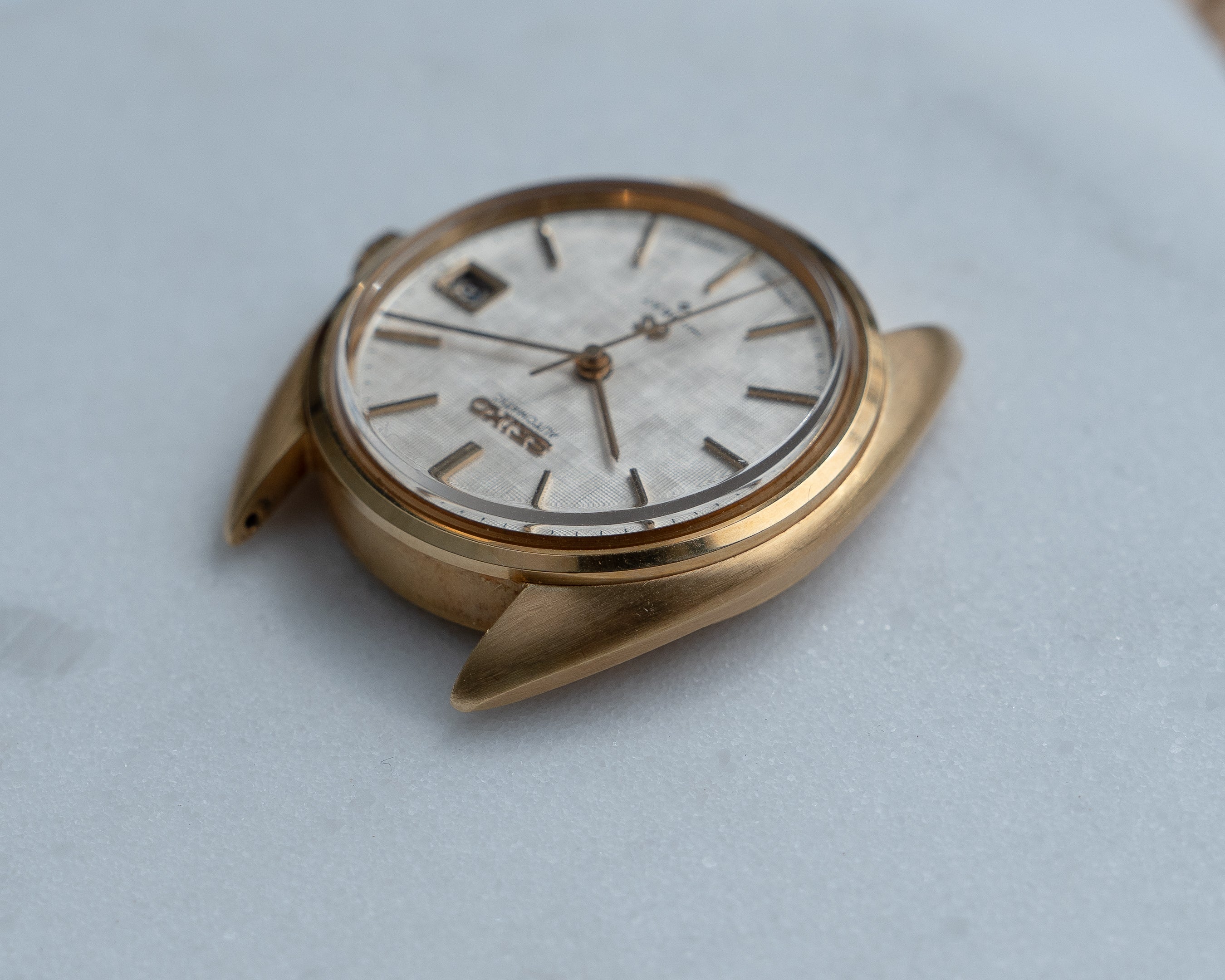 Grand Seiko 5645-7005 linen dial in 18k yellow gold July 1971