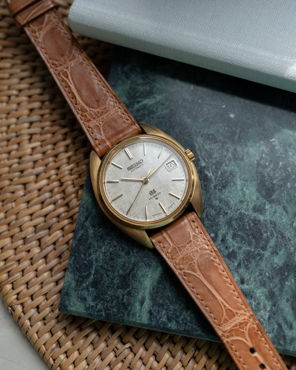 Grand Seiko 5645-7005 linen dial in 18k yellow gold July 1971