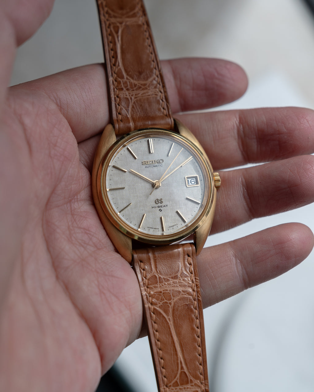 Grand Seiko 5645-7005 linen dial in 18k yellow gold July 1971