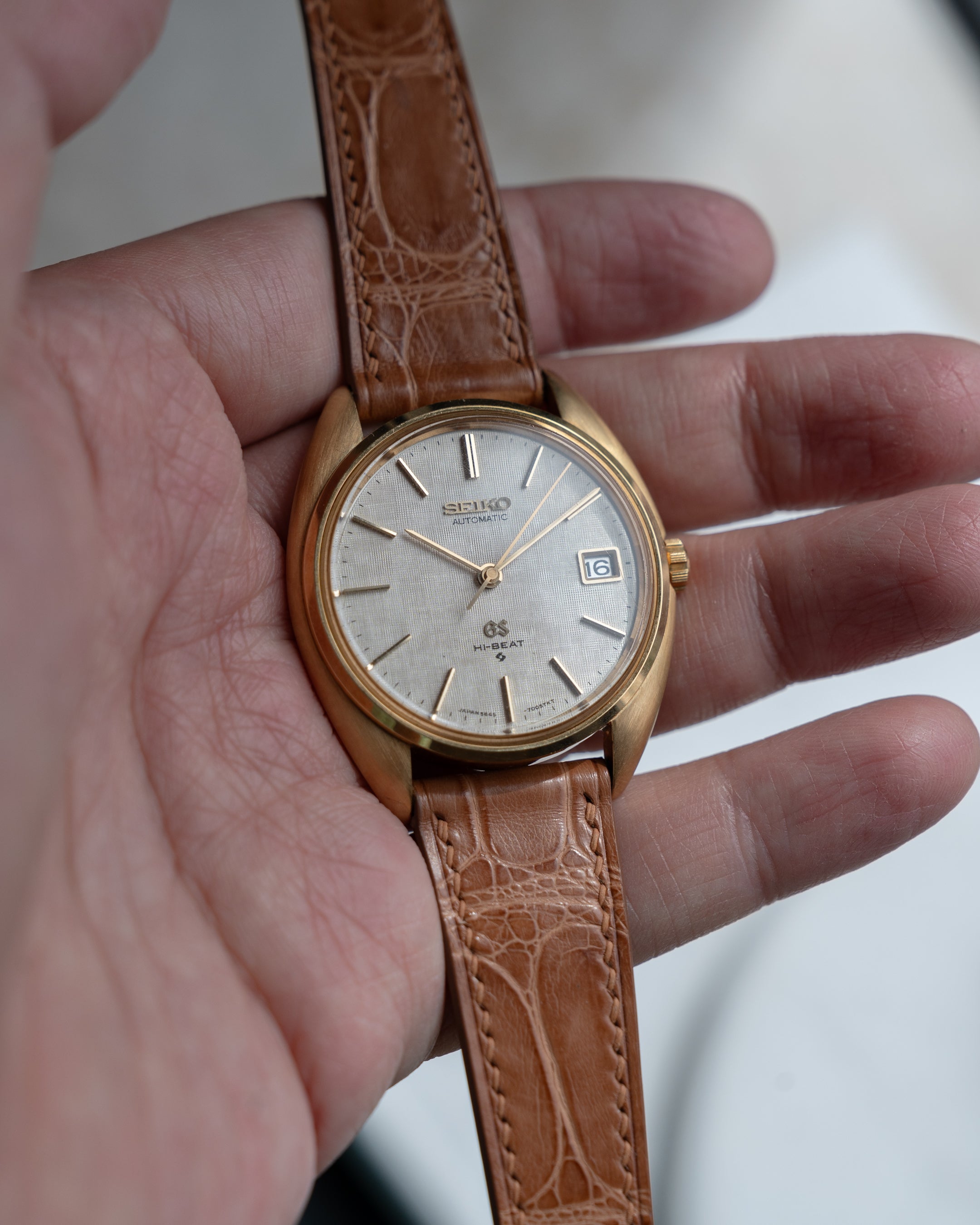 Grand Seiko 5645-7005 linen dial in 18k yellow gold July 1971