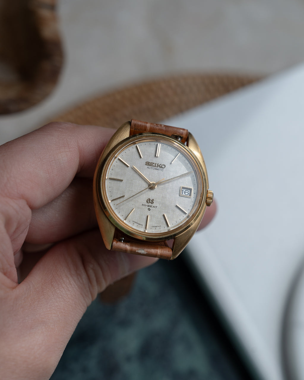 Grand Seiko 5645-7005 linen dial in 18k yellow gold July 1971