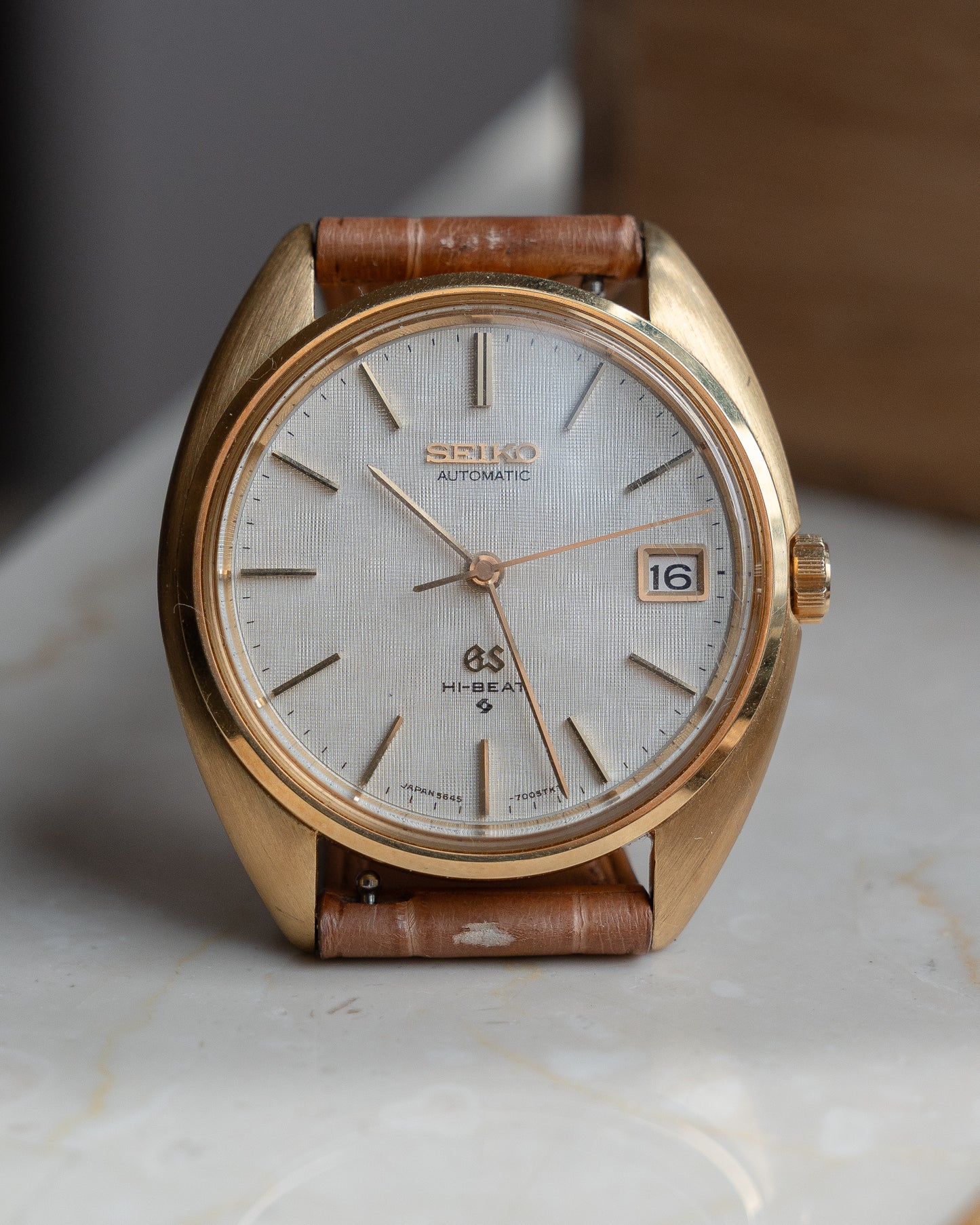Grand Seiko 5645-7005 linen dial in 18k yellow gold July 1971