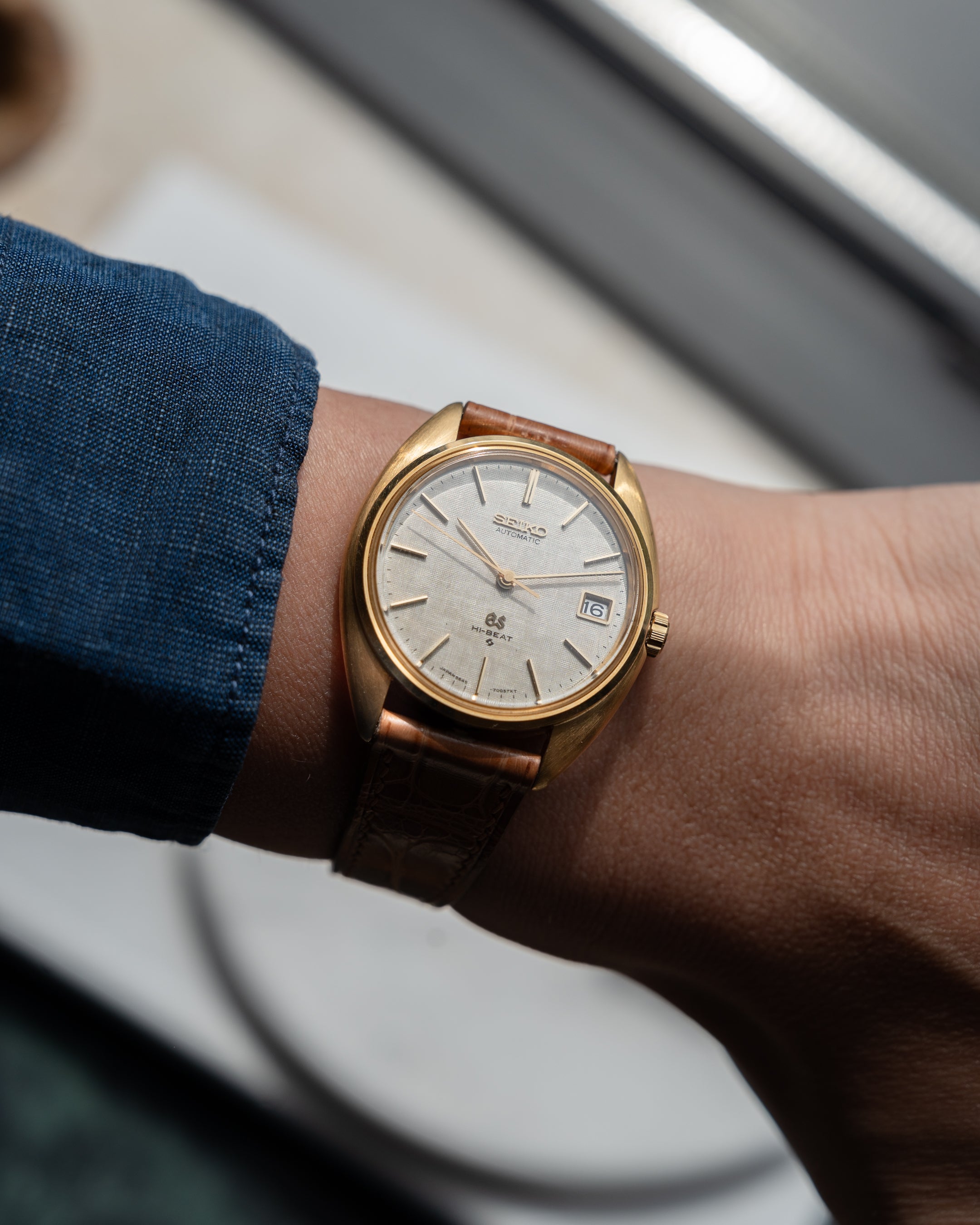 Grand Seiko 5645-7005 linen dial in 18k yellow gold July 1971