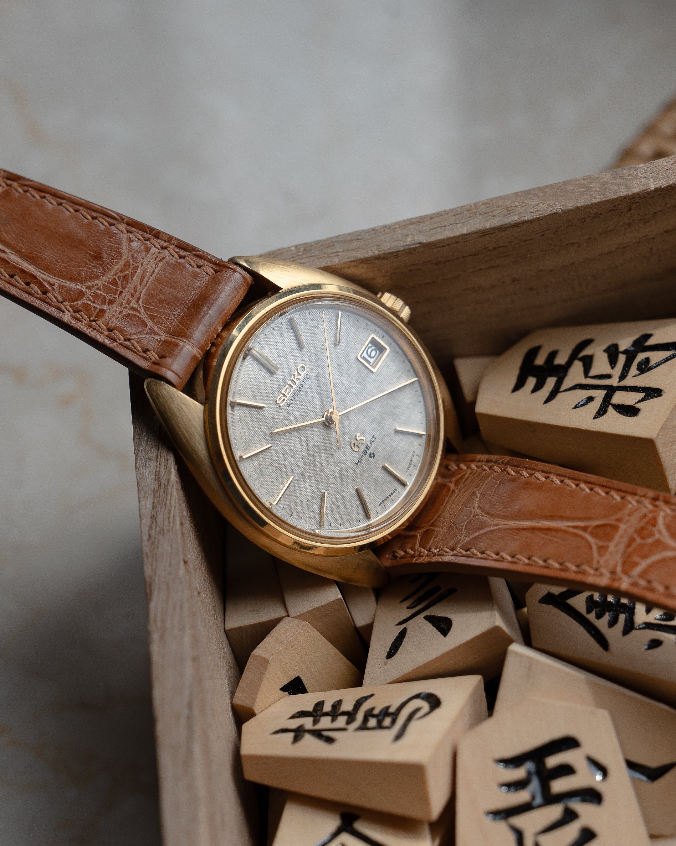 Grand Seiko 5645-7005 linen dial in 18k yellow gold July 1971