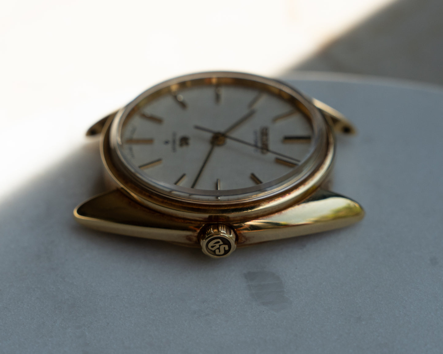 Grand Seiko 5641-7005 linen dial in 18k Yellow Gold, April 1971 with GS gold buckle