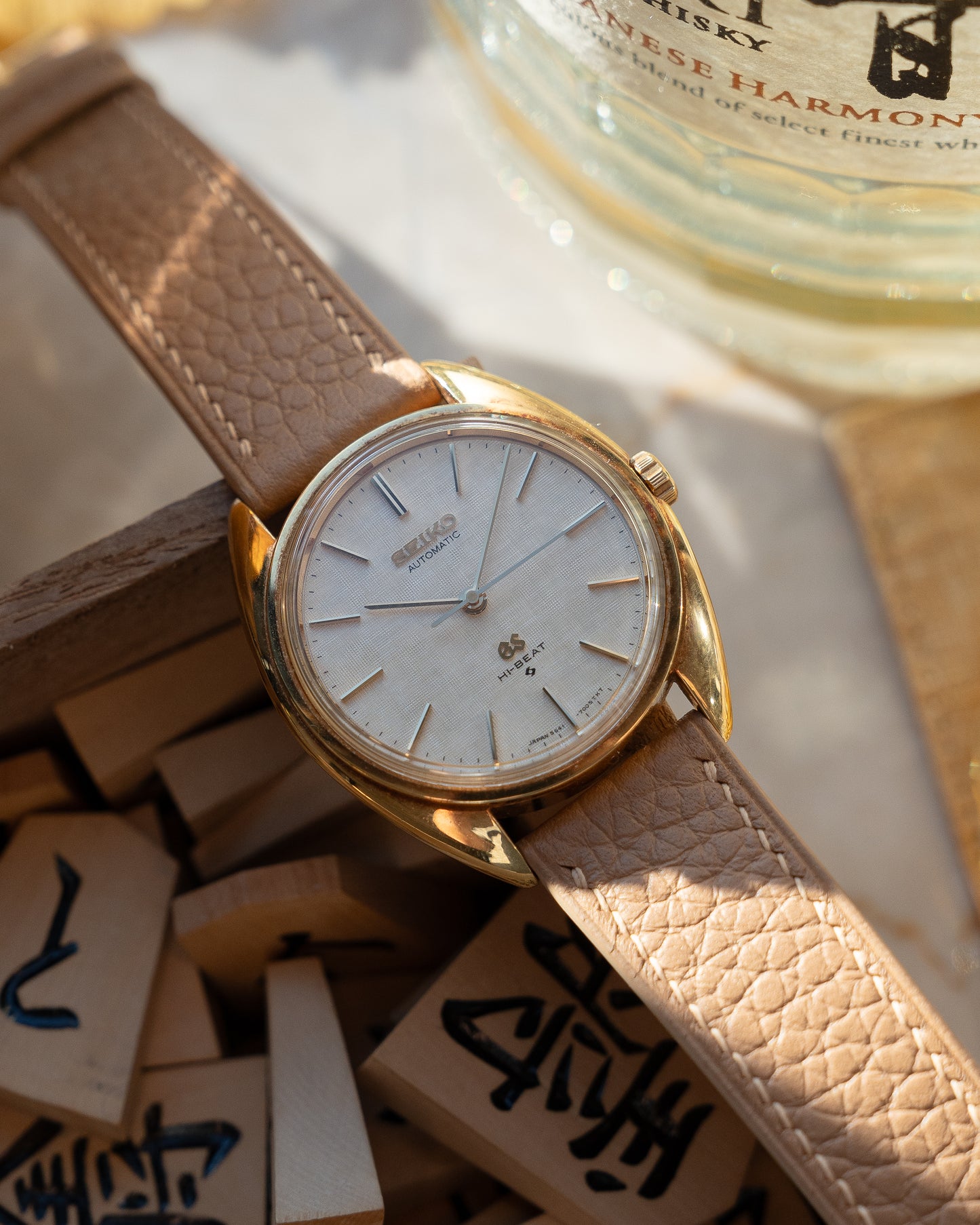 Grand Seiko 5641-7005 linen dial in 18k Yellow Gold, April 1971 with GS gold buckle