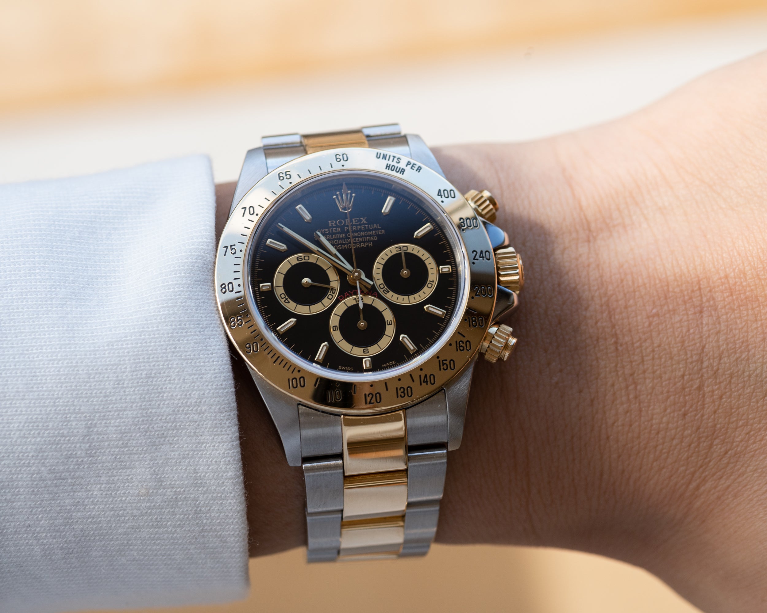 Rolex daytona black hot sale dial two tone