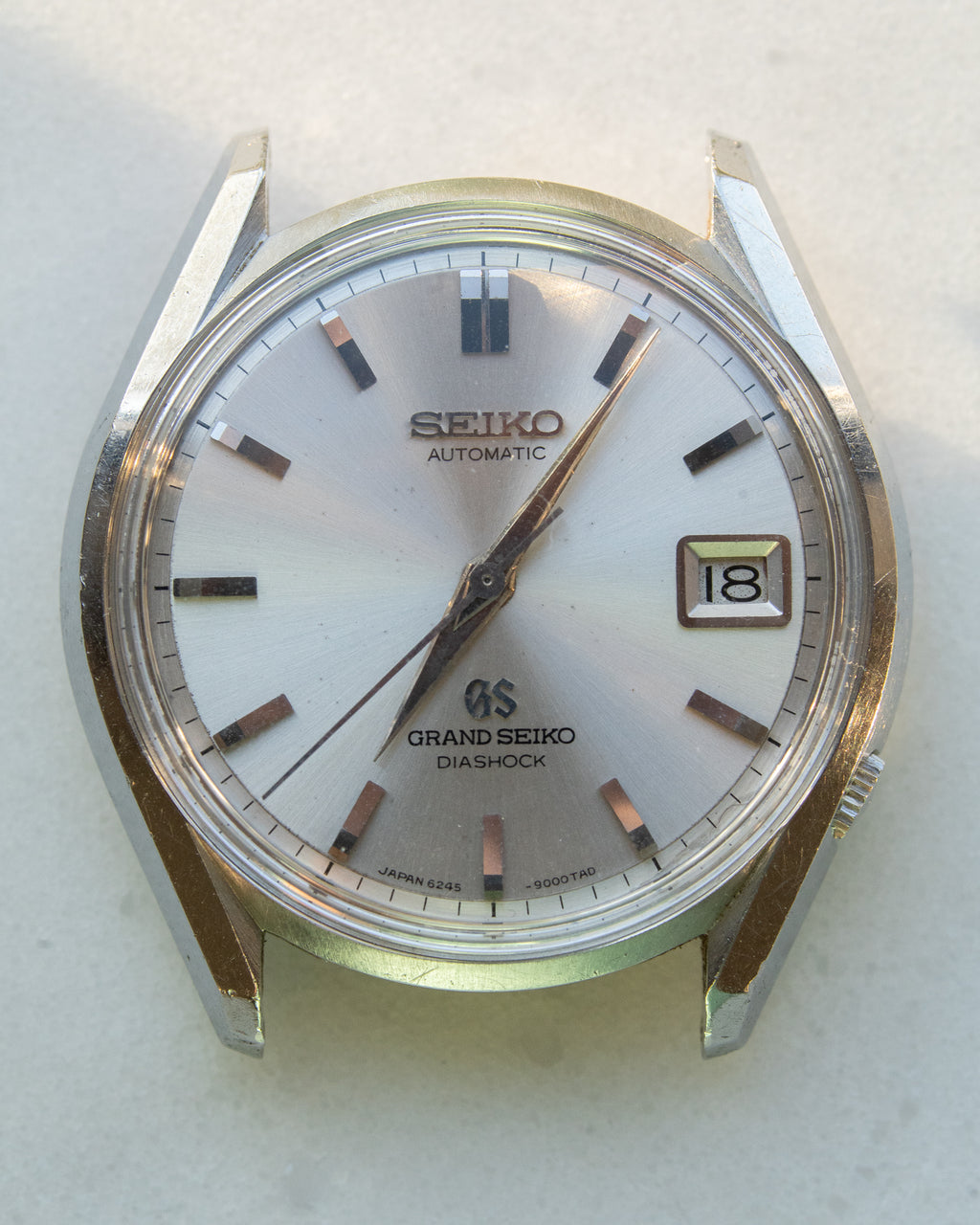 Grand Seiko 6245-9000 March 1966 lion gold medallion