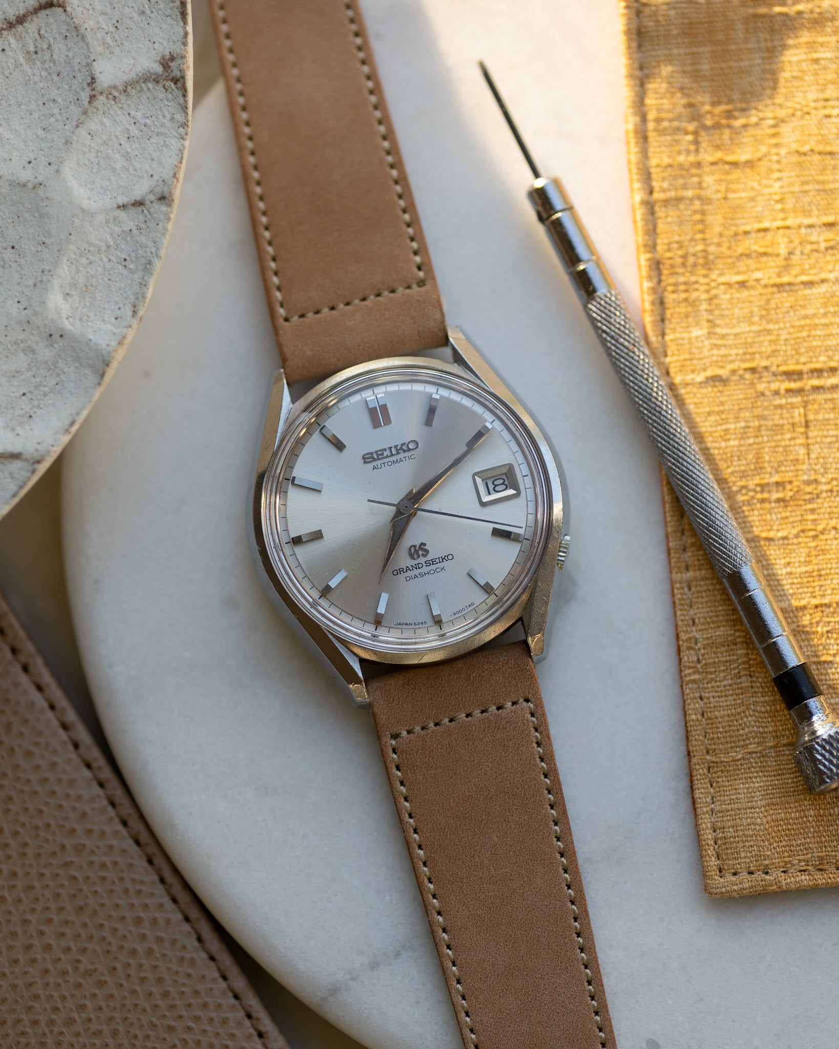 Grand Seiko 6245-9000 March 1966 lion gold medallion