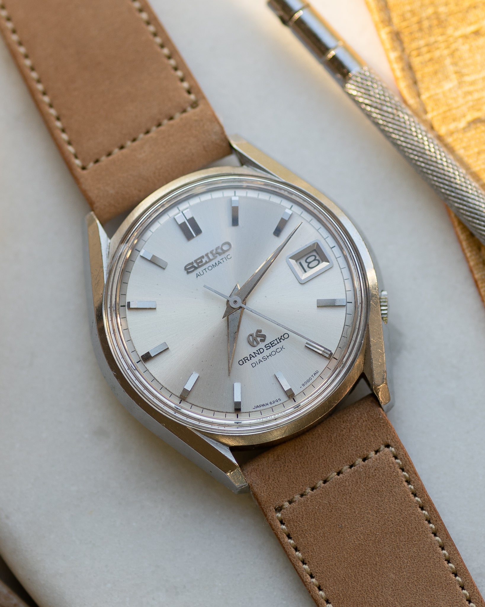 Grand Seiko 6245-9000 March 1966 lion gold medallion