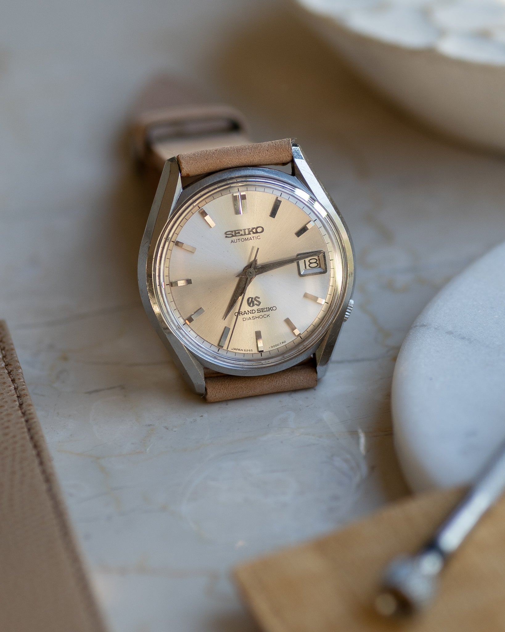 Grand Seiko 6245-9000 March 1966 lion gold medallion
