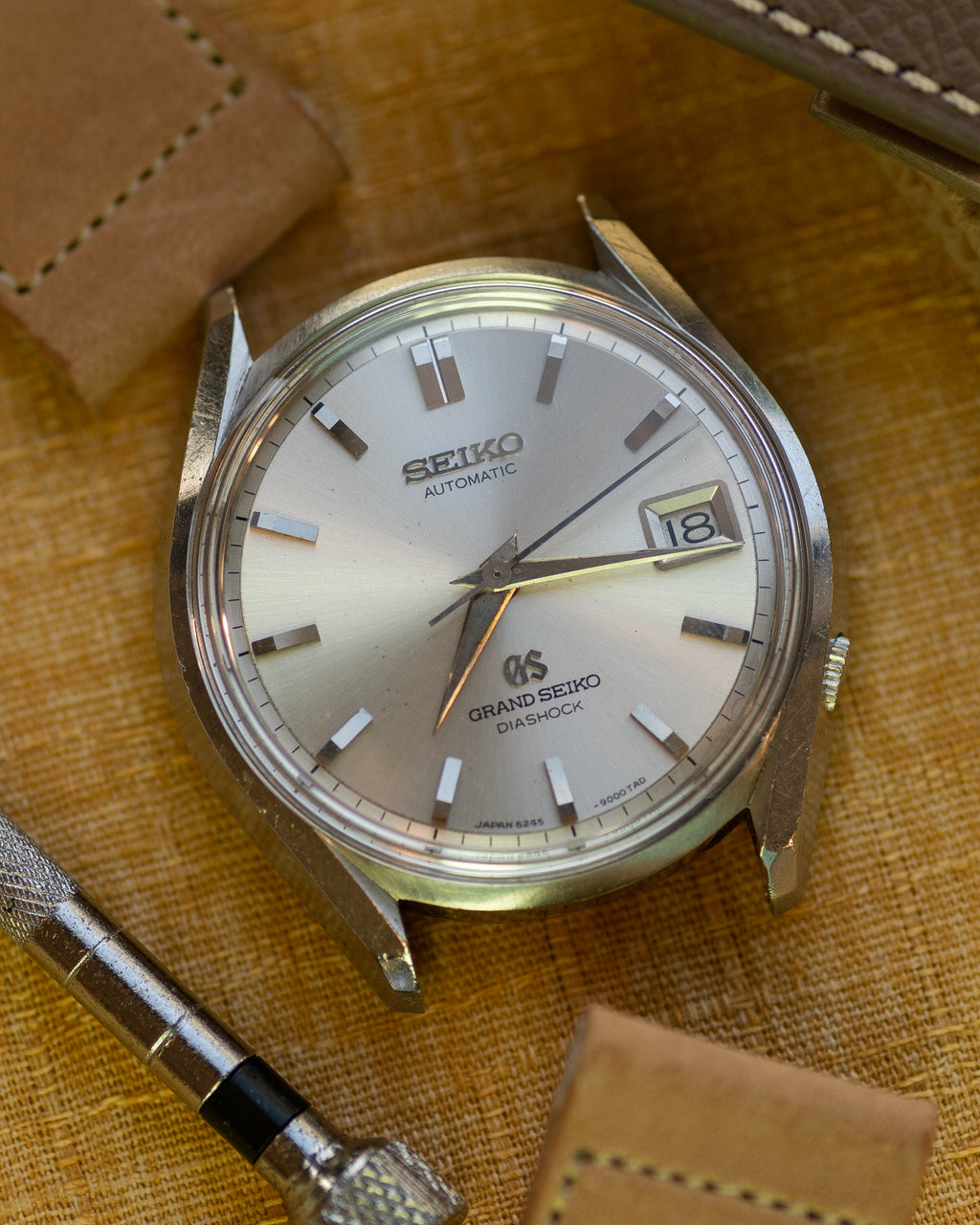 Grand Seiko 6245-9000 March 1966 lion gold medallion