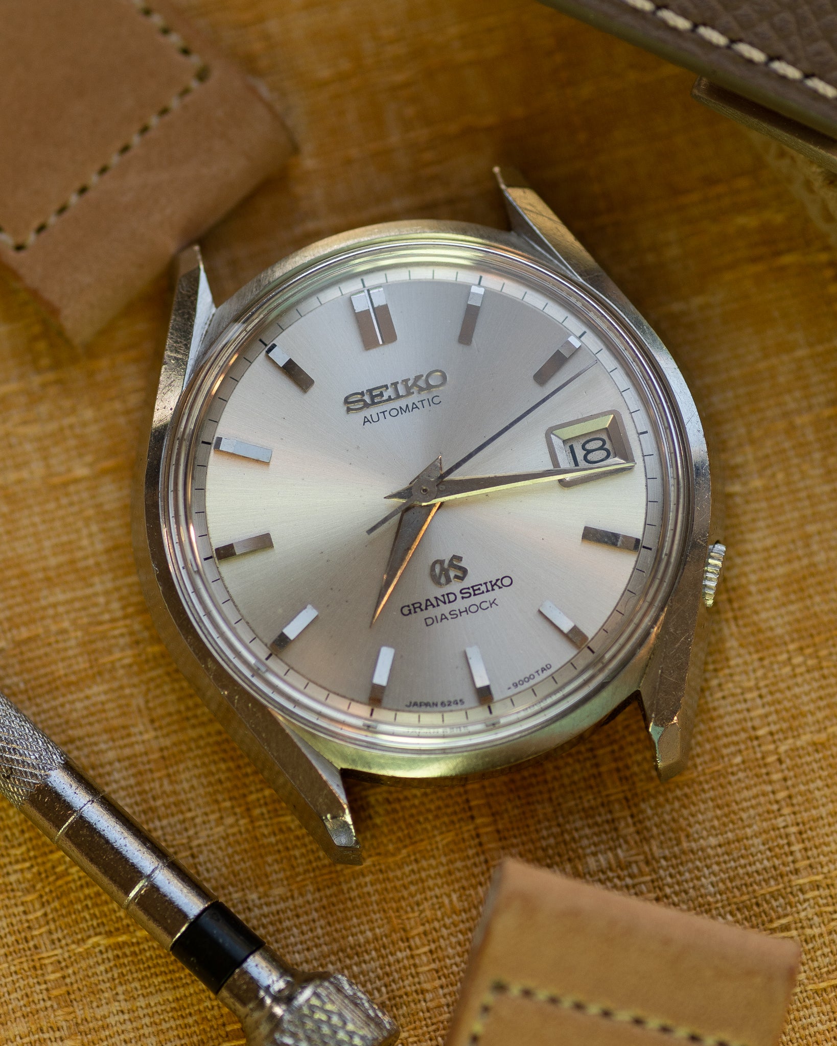 Grand Seiko 6245-9000 March 1966 lion gold medallion